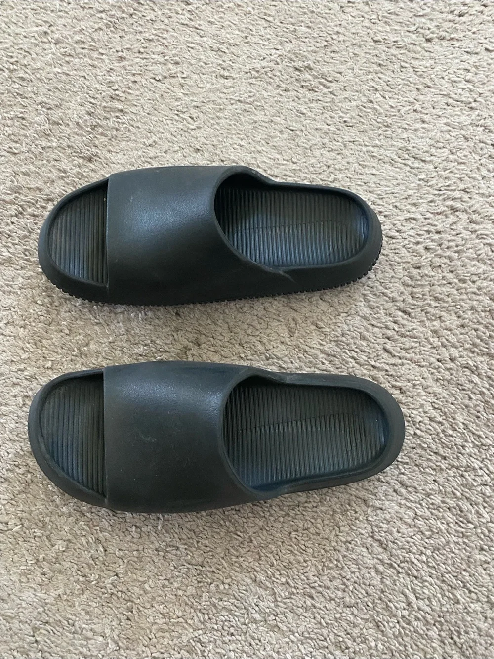 Nike Men's Black Slide Sandals with Embossed Swoosh